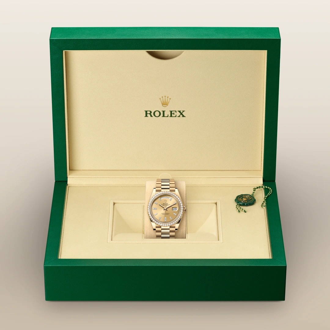 Oyster, 40 mm, oro amarillo y diamantes | M228348RBR-0002